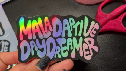 Maladaptive Daydreamer Holographic Sticker